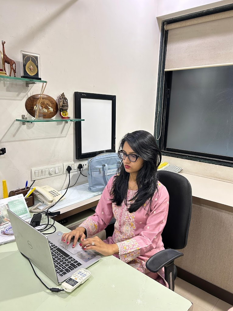 Dr. Himanshi Shrimali Ojha reviewing patient notes